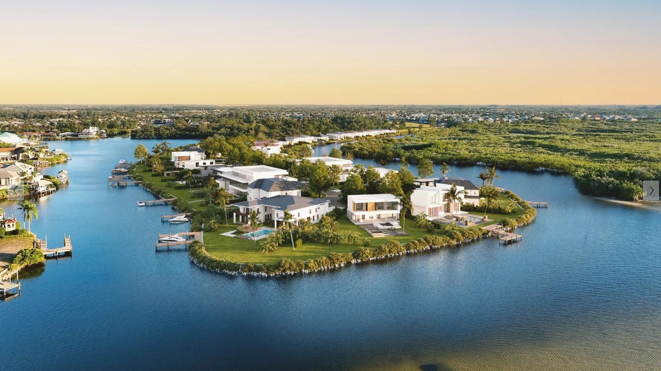Tampa Bay Waterfront — aerial view of luxury waterfront homes on a private island with lush tropical landscaping