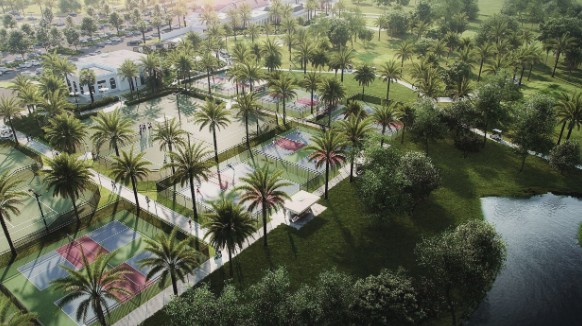 Aerial render of the completed park with mature palms, courts, and lake edge